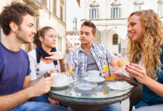 Students enjoying sunny terrace